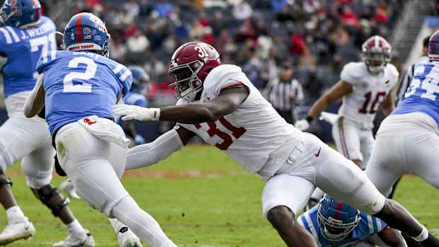 Nov 12, 2022; Oxford, Mississippi, USA; Alabama linebacker Will Anderson Jr. (31) pressures Ole Miss quarterback Jaxson Dart (2) at Vaught-Hemingway Stadium. Mandatory Credit: Gary Cosby Jr.-USA TODAY Sports